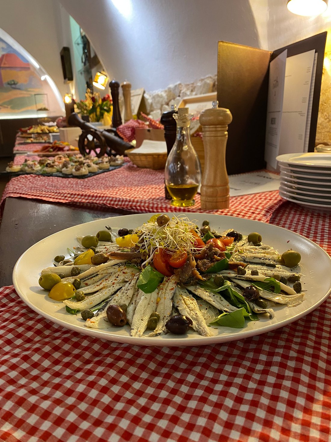 A chef preparing a dish in the kitchen